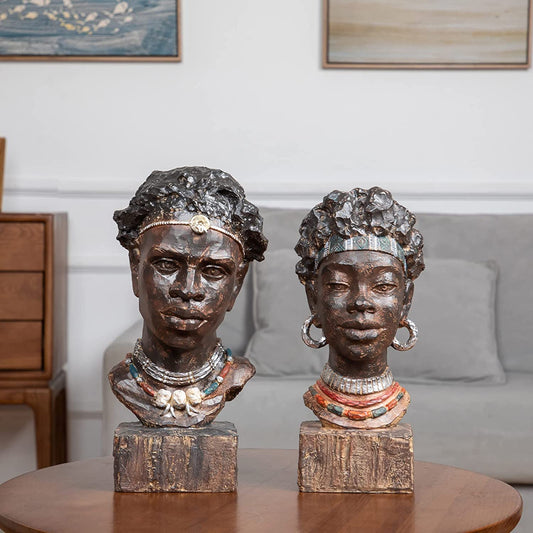 African Man and Woman Sculptures (Sold Separately)