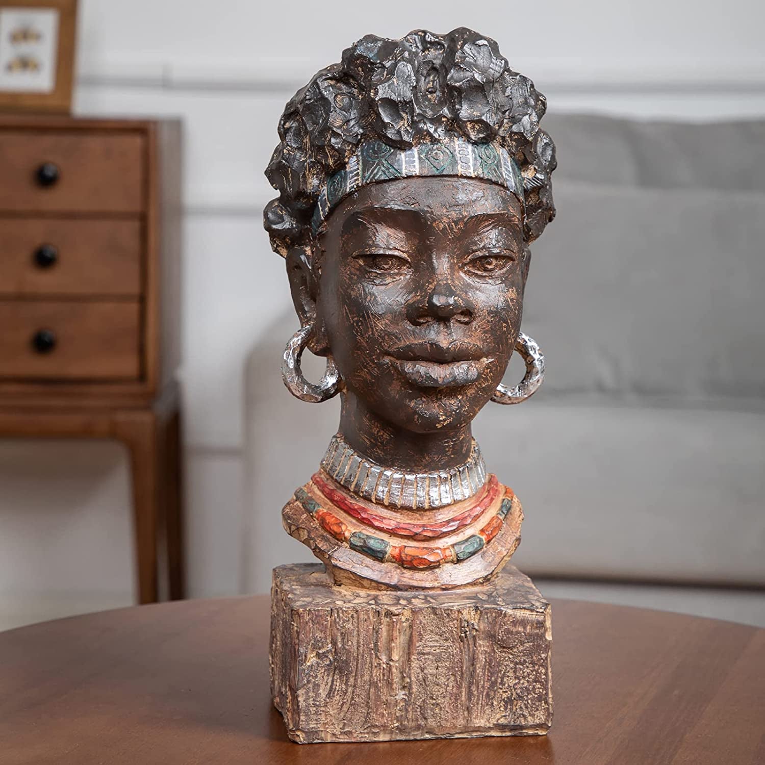 African Man and Woman Sculptures (Sold Separately)